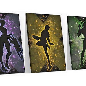 May include: Three canvas art prints featuring black silhouettes of figures against colorful backgrounds. The first has a purple and white speckled design, the second a yellow and gold speckled design, and the third a green speckled design.