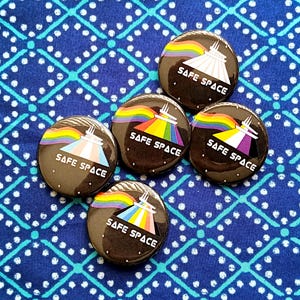 Safe Space (Mountain) buttons. 1” or 1.5 inch hand-pressed pin set. Pride, Queer, Enby and Trans pins for LGBTQIA theme park fans