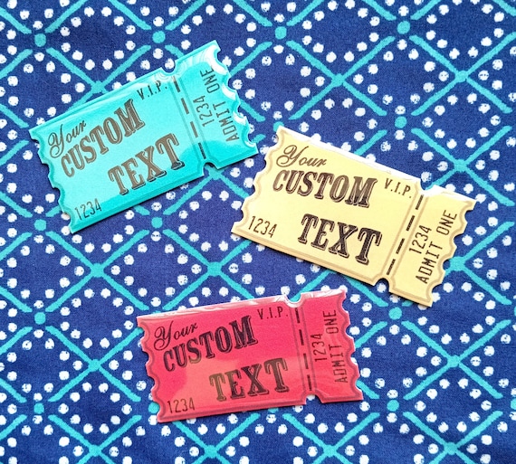 A custom resin-and-shrink-plastic VIP ticket stub you can personalize — handmade in a genuinely unusual material combo with 67 favorites proving real demand.