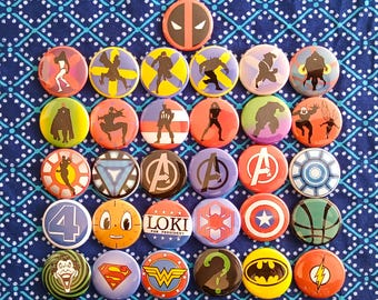 Classic Heroes Comic logos button lot. 1” or 1.5 inch hand-pressed pinback button set. Custom shop bundle for Super Hero and Villain fans