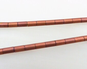 20 copper beads, 3/5 hematite tubes