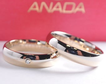 1 pair of wedding rings gold 333 with cubic zirconia - bicolor yellow gold / white gold - B: 4 mm