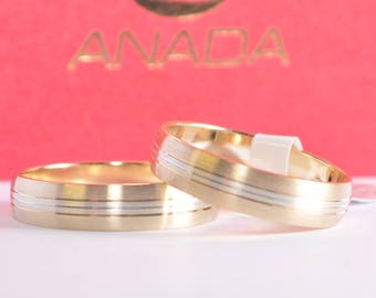 1 pair of wedding rings - gold 333 - bicolor - width 4.5 mm - thickness 1.2 mm - lengthways matt