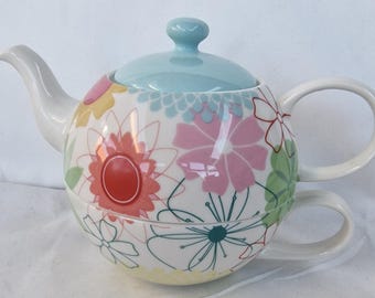 Portmeirion Pottery One Cup Stacking Teekanne mit Tasse im Crazy Daisy Muster.