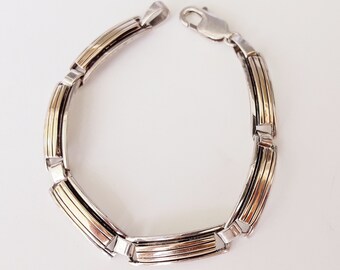 Classic Contemporary Navajo Sterling silver and 14K Gold link bracket designed by MM Rogers