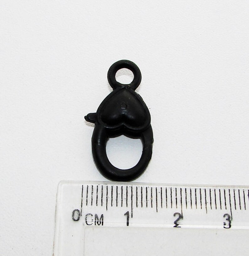 25.00 mm heart is smooth. 8877930 Black MAT lobster clasp