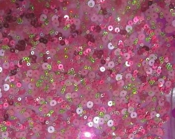 rosafarbene Stoffe mit glänzenden und dehnbaren Pailletten aus Lycra-Voile