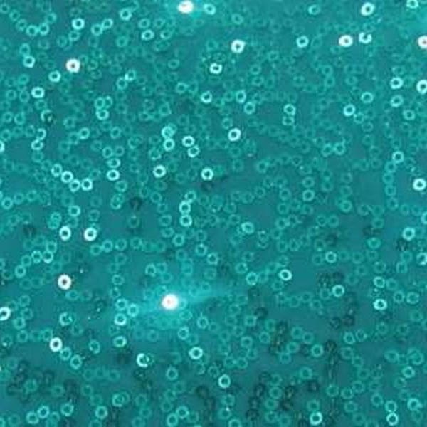 tissu turquoise en sequins brillant et  extensible en lycra