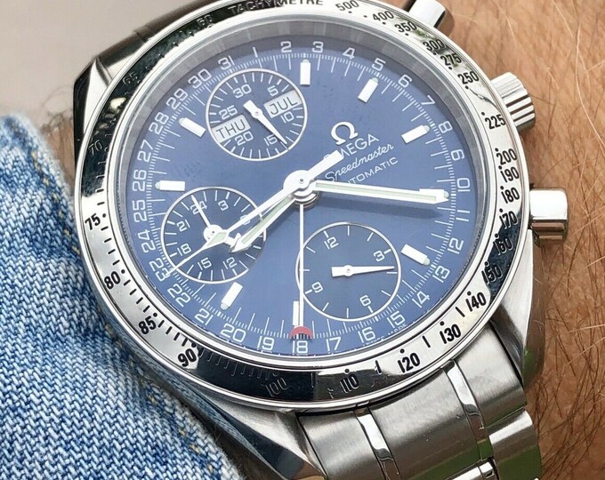 omega speedmaster triple date blue dial