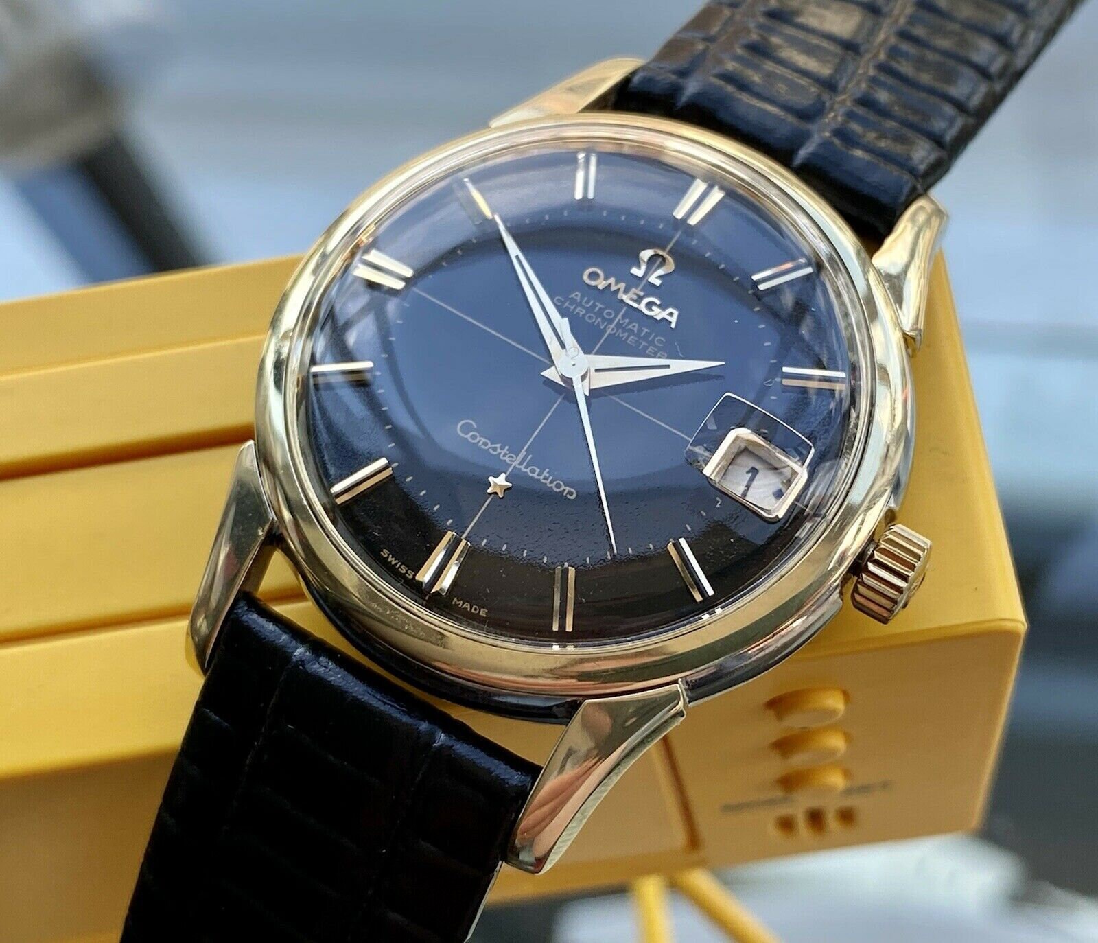 omega pie pan black dial