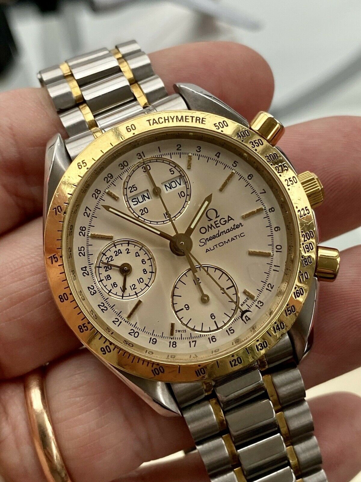 omega speedmaster 18k gold