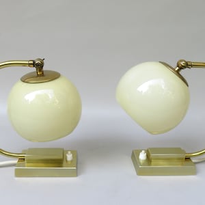 1 pair of bedside lamps, Art Deco, brass, gold anodized, cased glass