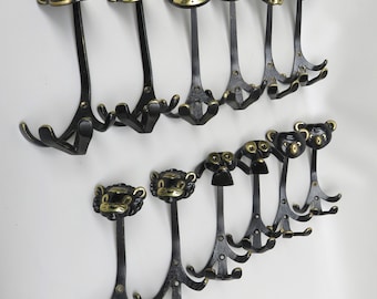 Pack of 12 coat hooks, hooks, 1950s, Walter Bosse, brass, black