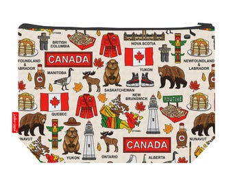 May include: A beige cosmetic bag featuring a repeating pattern of Canadian icons and provinces. The design includes maple leaves, flags, bears, beavers, and the word "Canada" in red. The bag has a black zipper.