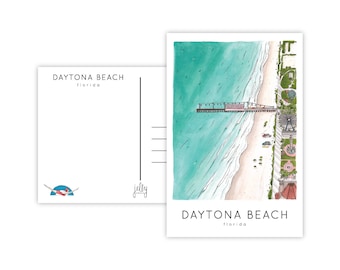 May include: A postcard featuring an illustration of the Daytona Beach pier, with the ocean and beach in the background. The text "DAYTONA BEACH Florida" is printed at the bottom of the postcard.