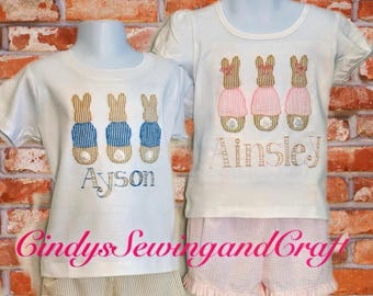 Siblings matching Easter outfits. Appliquéd bunnies in Seersucker fabric with matching shorts. Furry bunny tails too!! Personalized.