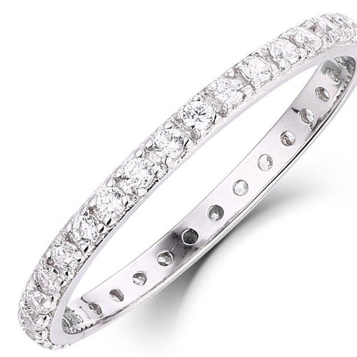 Round Cz Eternity Channel Set Wedding Band .925 Sterling Silver Ring Sizes 2-10 Round Cz Eternity Channel Set Wedding Band .925 Sterling Silver Ring Sizes 2-10