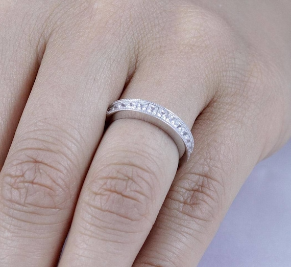 Round Cz Eternity Channel Set Wedding Band .925 Sterling Silver Ring Sizes 2-10 Round Cz Eternity Channel Set Wedding Band .925 Sterling Silver Ring Sizes 2-10