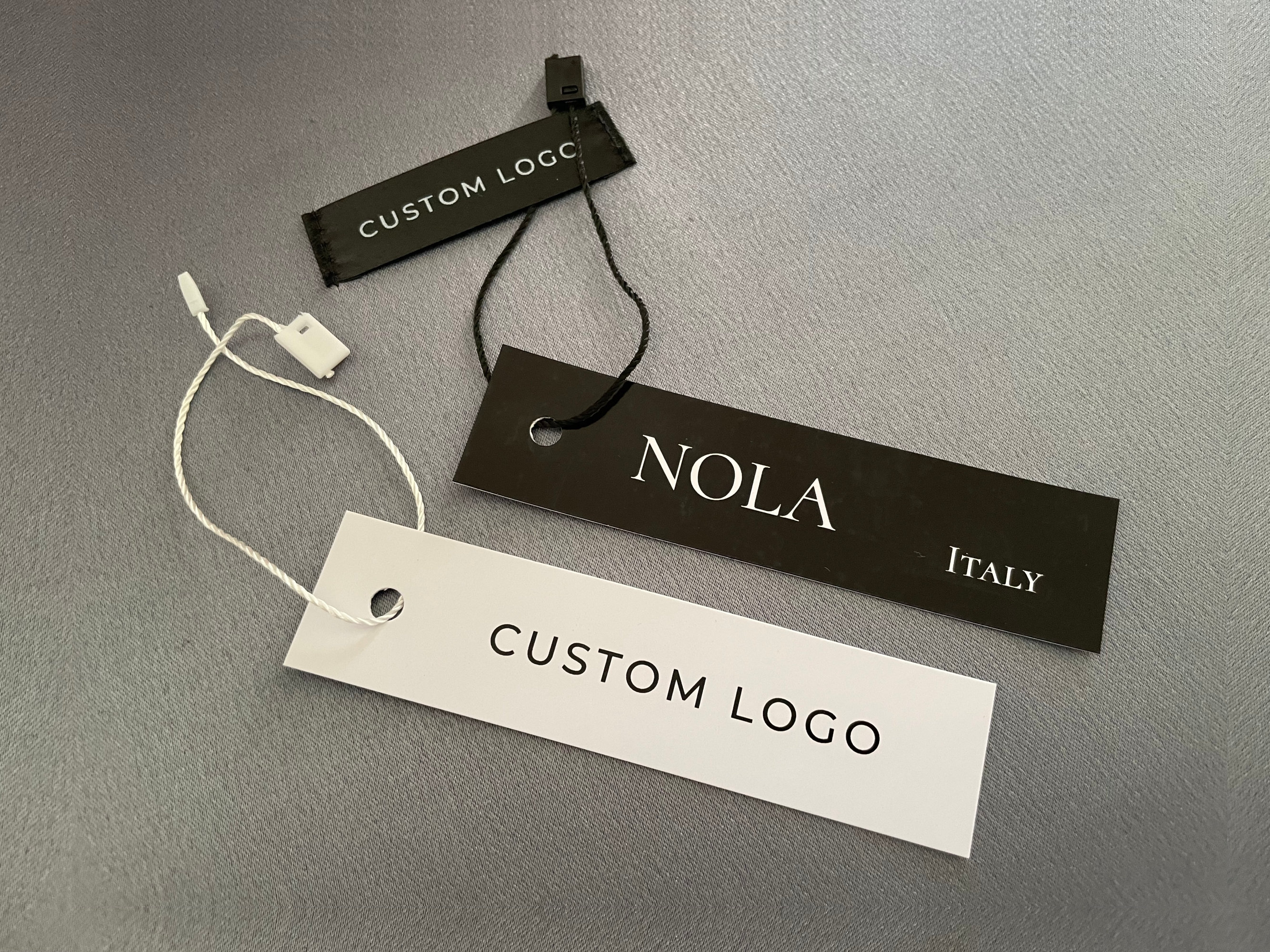 Custom Hang Tags with Strings, 1 in. x 4 in. (25 mm x 100 mm), Black, Cream or White Logo Hang Tags for Clothing