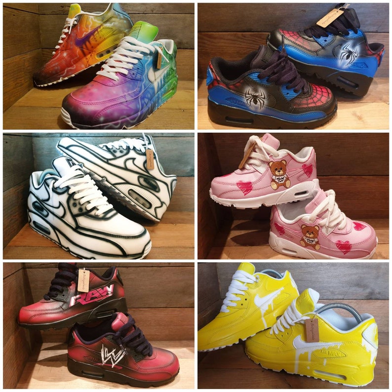 May include: A collection of six custom-painted Air Force 1 sneakers. The sneakers feature various designs, including a rainbow, a spider-man, a teddy bear, a wrestling logo, and a yellow paint drip.