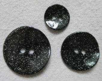 Glittery black metal button