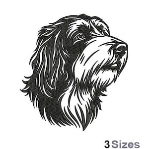 May include: Black and white embroidered design of a dog's head, featuring detailed fur and facial features. The dog is looking to the right. The text "3 Sizes" is at the bottom.