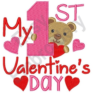 May include: Pink and red embroidered design with a teddy bear holding a heart and the text "My 1st Valentine's Day".