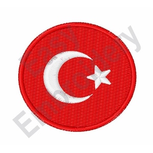 Può includere: Un cerotto circolare rosso con una mezzaluna bianca e una stella al centro. Il cerotto è ricamato con un contorno bianco.