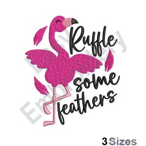 May include: Pink flamingo with outstretched wings and the text "Ruffle some feathers" in black lettering.