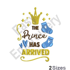 Könnte beinhalten: Stickerei mit einer goldenen Krone, blauen Babyschuhen und dem Text "The Prince Has Arrived".