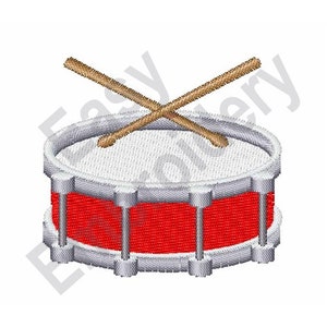 Puede incluir: Un tambor rojo y plateado con dos baquetas de madera cruzadas en la parte superior.