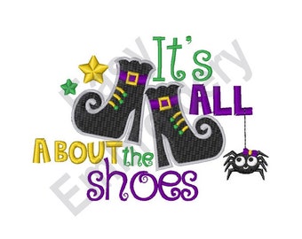 May include: It's all about the shoes, a Halloween-themed embroidery design featuring a pair of black witch's shoes with purple and green accents, a spider, and the text "It's all about the shoes".