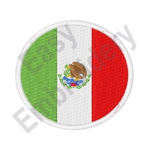 May include: A circular embroidered patch featuring the Mexican flag. The flag is green, white, and red with the Mexican coat of arms in the center.