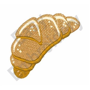 Puede incluir: Un croissant de color marrón dorado, un tipo de pastelería, con una textura hojaldrada.