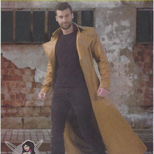 May include: A brown long coat with a black shirt and blue jeans. The coat has a collar and a belt. The model is standing in front of a brick wall. The text "McCall's Costumes" is at the top of the image.