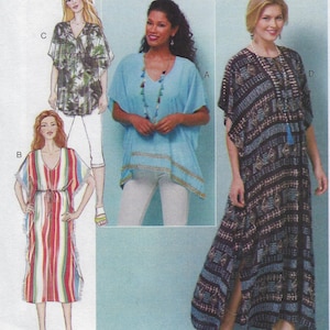 May include: Four different styles of tunics with long sleeves and a V-neck. The tunics are in various colors and patterns, including blue, green, black, and white.