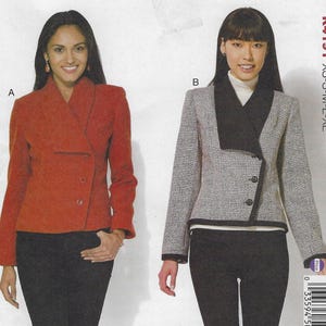 May include: Two women's jackets with different patterns and colors. The jacket on the left is red and the jacket on the right is black and white with a black trim. Both jackets have a collar that wraps around the neck and a button closure.