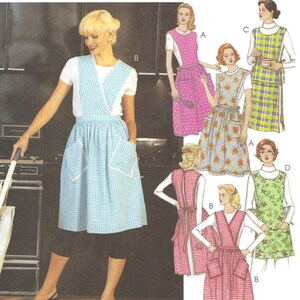 May include: A sewing pattern envelope titled The Retro collection featuring illustrations of various apron designs. The aprons include wrap-style and sleeveless options with patterns like gingham, floral, and plaid, featuring pockets and tie-back closures.