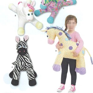 May include: Four plush animal toys labeled A, B, C, and D. A is a black and white zebra. B is a white unicorn with a pink mane and gold horn. C is a pink floral patterned winged horse. D is a yellow giraffe with purple spots and a blue mane.
