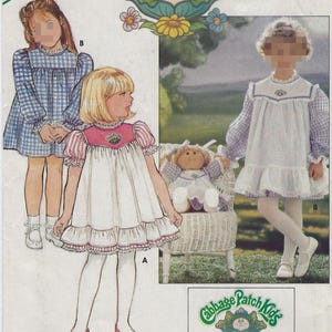 3086 Butterick Cabbage Patch - Girls A-line Dress or Pinafore and matching doll clothes & Transfers - uncut sewing pattern - size (5-6-6x)