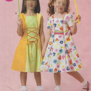 May include: Two young girls in dresses, holding pinwheels. One dress is yellow with orange polka dots and a corset-style front. The other is white with a floral pattern and red trim. The word "EASY" is in a pink circle.