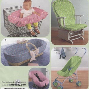 May include: An image showcasing baby-related items. Includes a pink shopping cart cover, a green stroller, a blue bassinet with a handle, a pink car seat cover, and a green rocking chair. The items are patterned with floral and other designs.