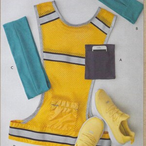 May include: A yellow safety vest with reflective strips, a black phone pocket, and a small yellow pocket.  There is a teal headband, a teal armband, and two yellow running shoes.