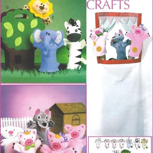 May include: A McCall's Crafts pattern sheet featuring felt hand puppets including a lion, elephant, zebra, wolf, and pigs. The image displays finished puppets, a puppet theater, and a tree, with diagrams showing dimensions of 12 inches by 11.5 inches.