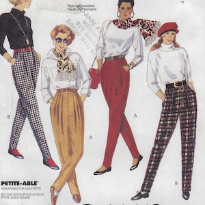 May include: Vintage fashion pattern featuring four women's outfits. The outfits include high-waisted pants in various colors and patterns, paired with tops and accessories like scarves and belts. The pattern is labeled "PETITE-ABLE".