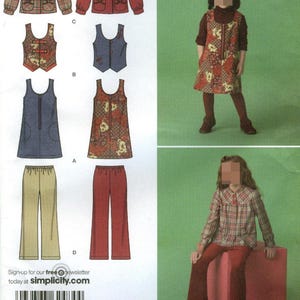 May include: A children's clothing pattern featuring various outfits. The pattern includes jackets, vests, dresses, and pants in different colors and patterns. The outfits are modeled on children. The pattern is from Simplicity.