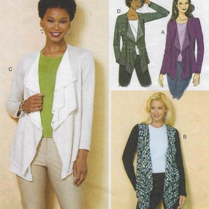 May include: A woman wearing a light gray cardigan with a draped front over a green top and tan pants. The image also shows illustrations of three other cardigan designs: a green, a purple, and a black and white patterned cardigan.