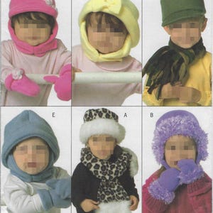 May include: A collection of children's winter hats, scarves, and mittens in various colors. The hats include a pink hat with a flower, a yellow hat with a bow, a green hat, a blue hat, a leopard print hat, and a purple hat. The scarves and mittens are in matching colors.