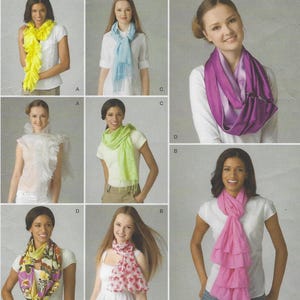 May include: A collection of six different ways to wear a scarf. The scarves are in various colors and patterns, including yellow, blue, purple, green, pink, and a multi-colored floral pattern.