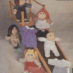May include: A set of doll clothes for a 16-inch soft-sculptured doll. The set includes a blue overall, a white dress with a floral pattern, a purple dress, a white onesie, a white shirt, and a purple skirt.